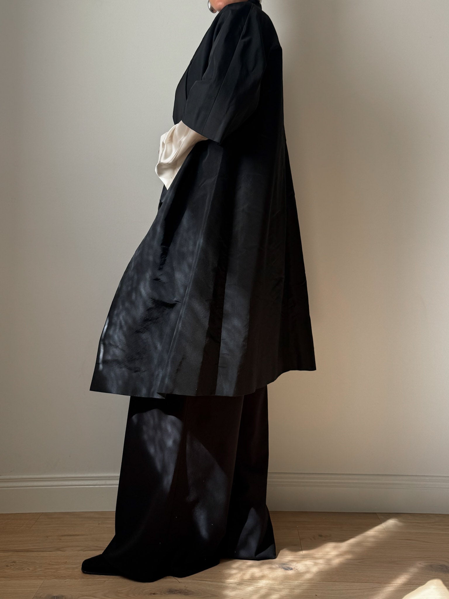 Tailored black dust coat