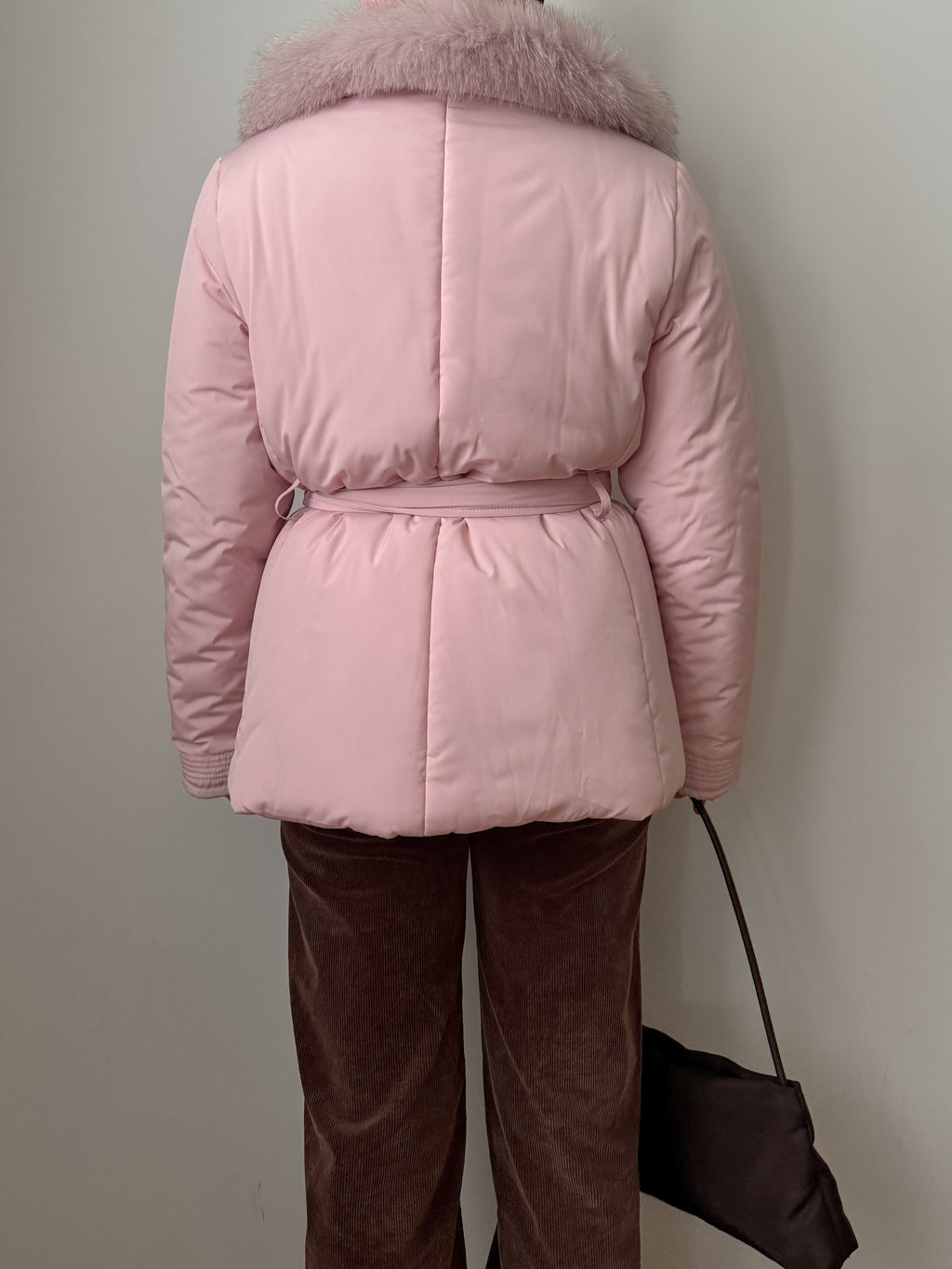 Padded jacket with real fur details