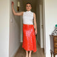 Sequins orange midi skirt