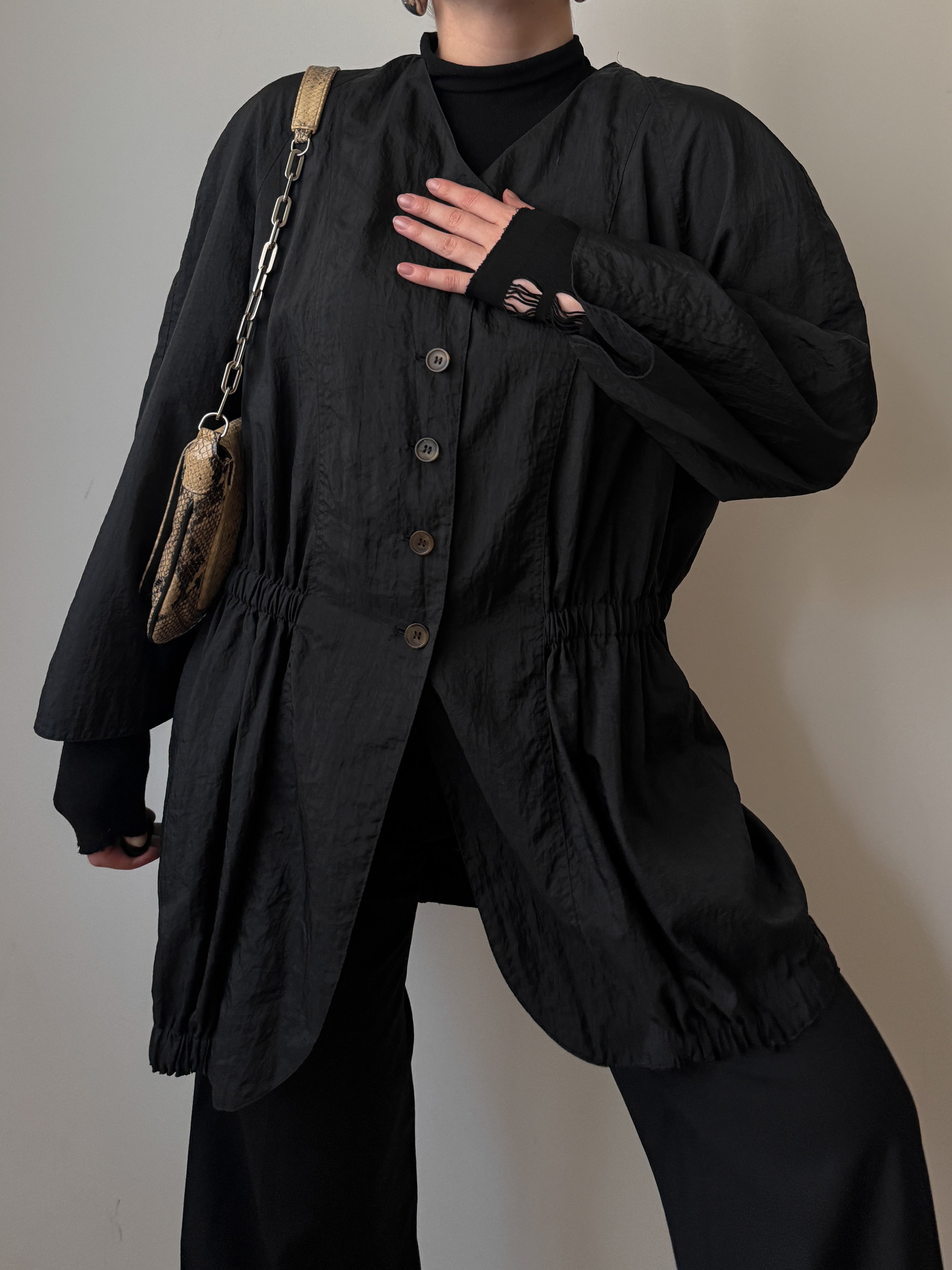 Black jacket with gathered waist