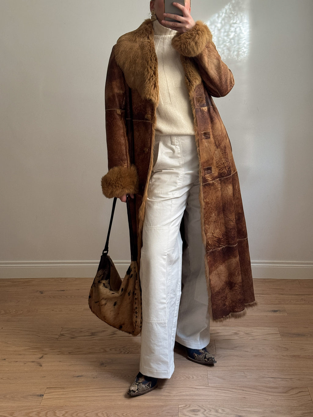 Fur-lined leather coat