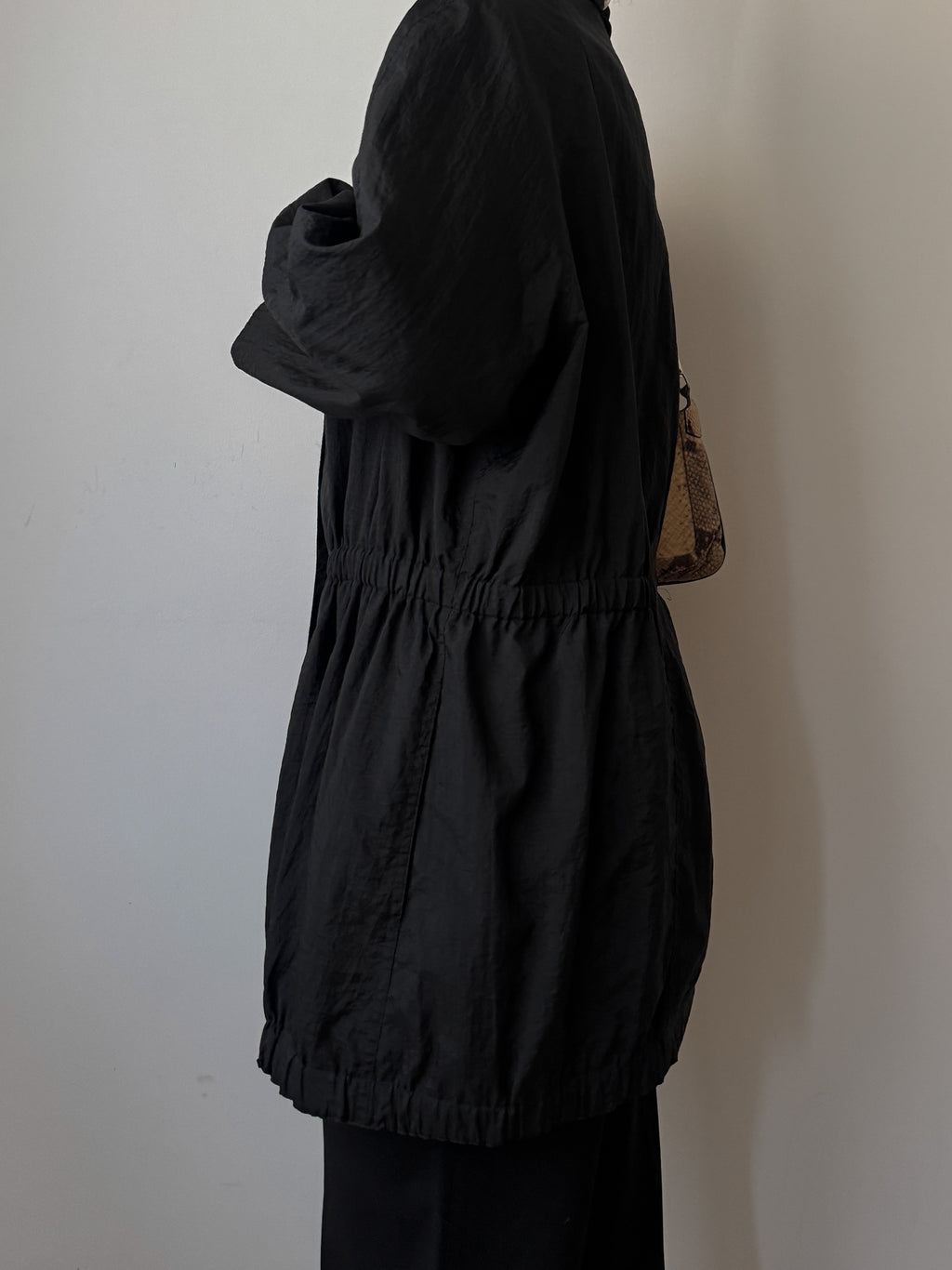 Black jacket with gathered waist