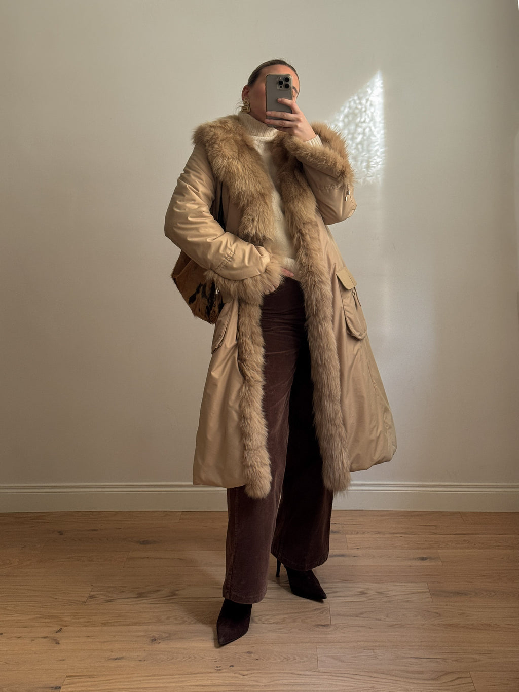 Padded coat with real fur details