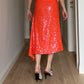 Sequins orange midi skirt