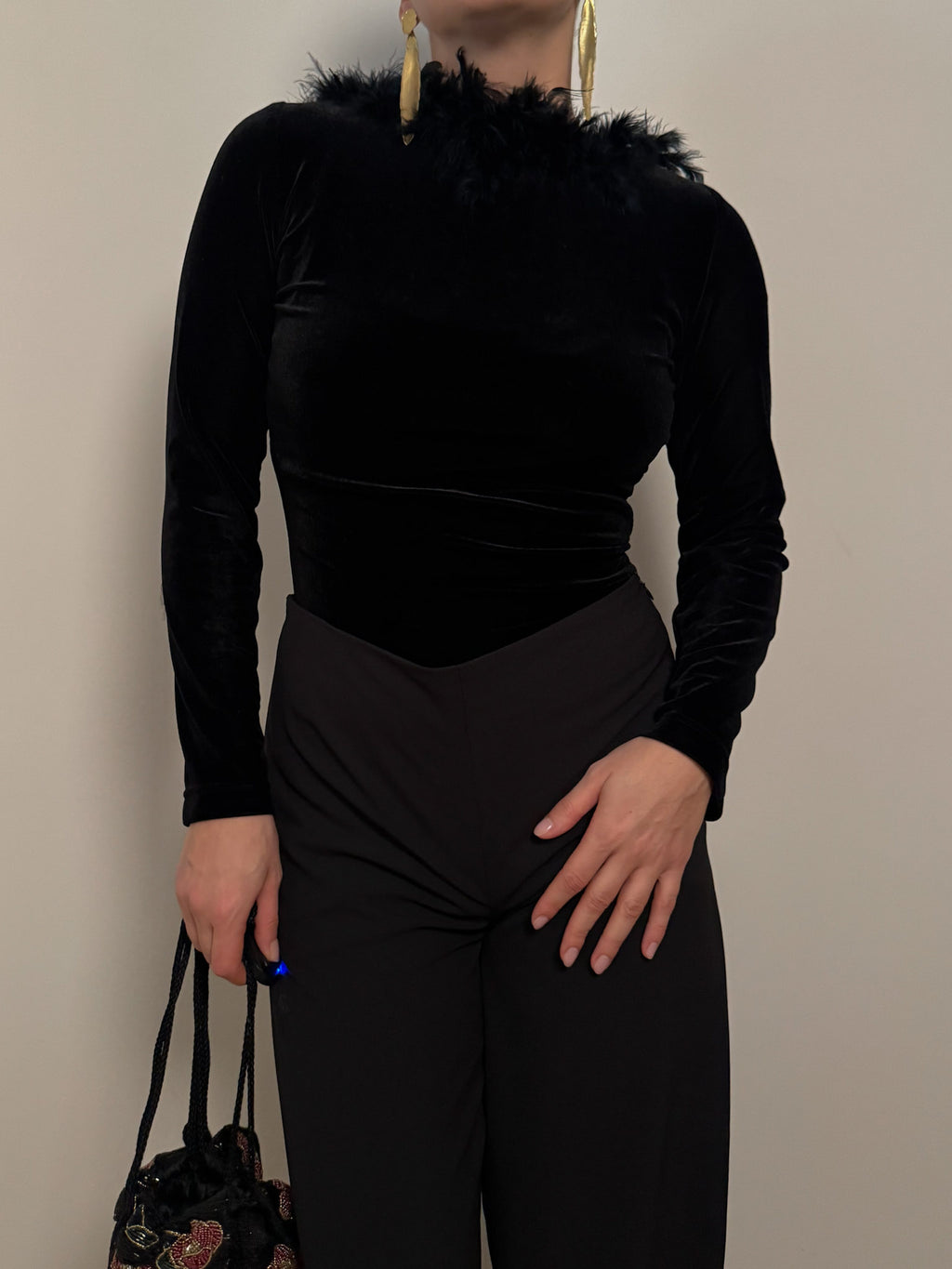 Velvet and feathers black top