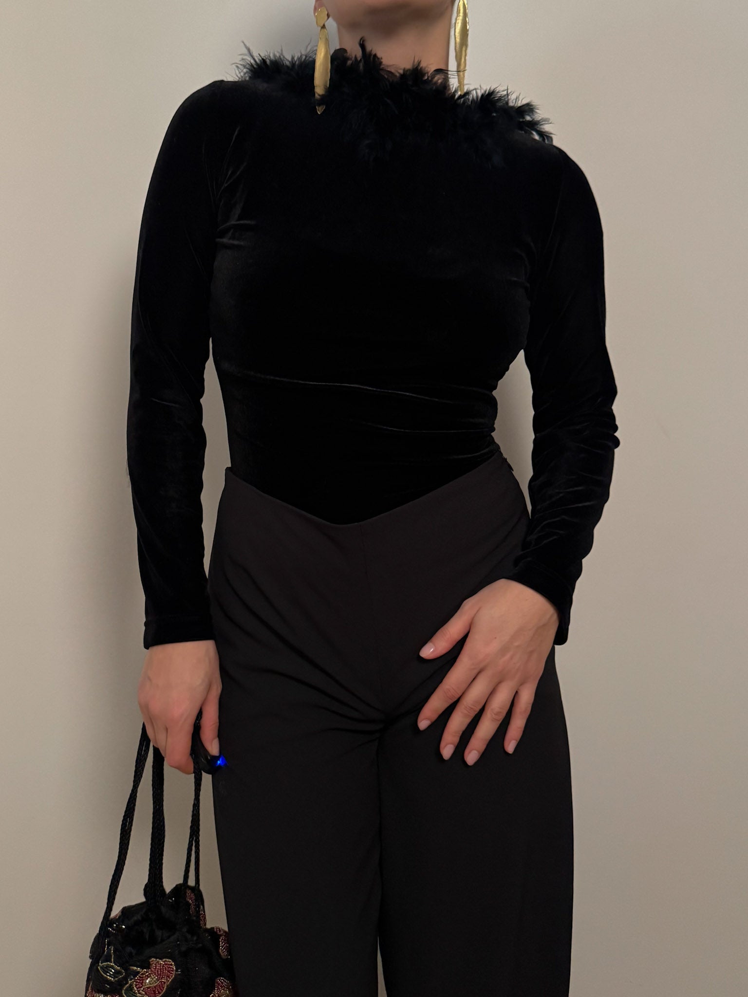 Velvet and feathers black top