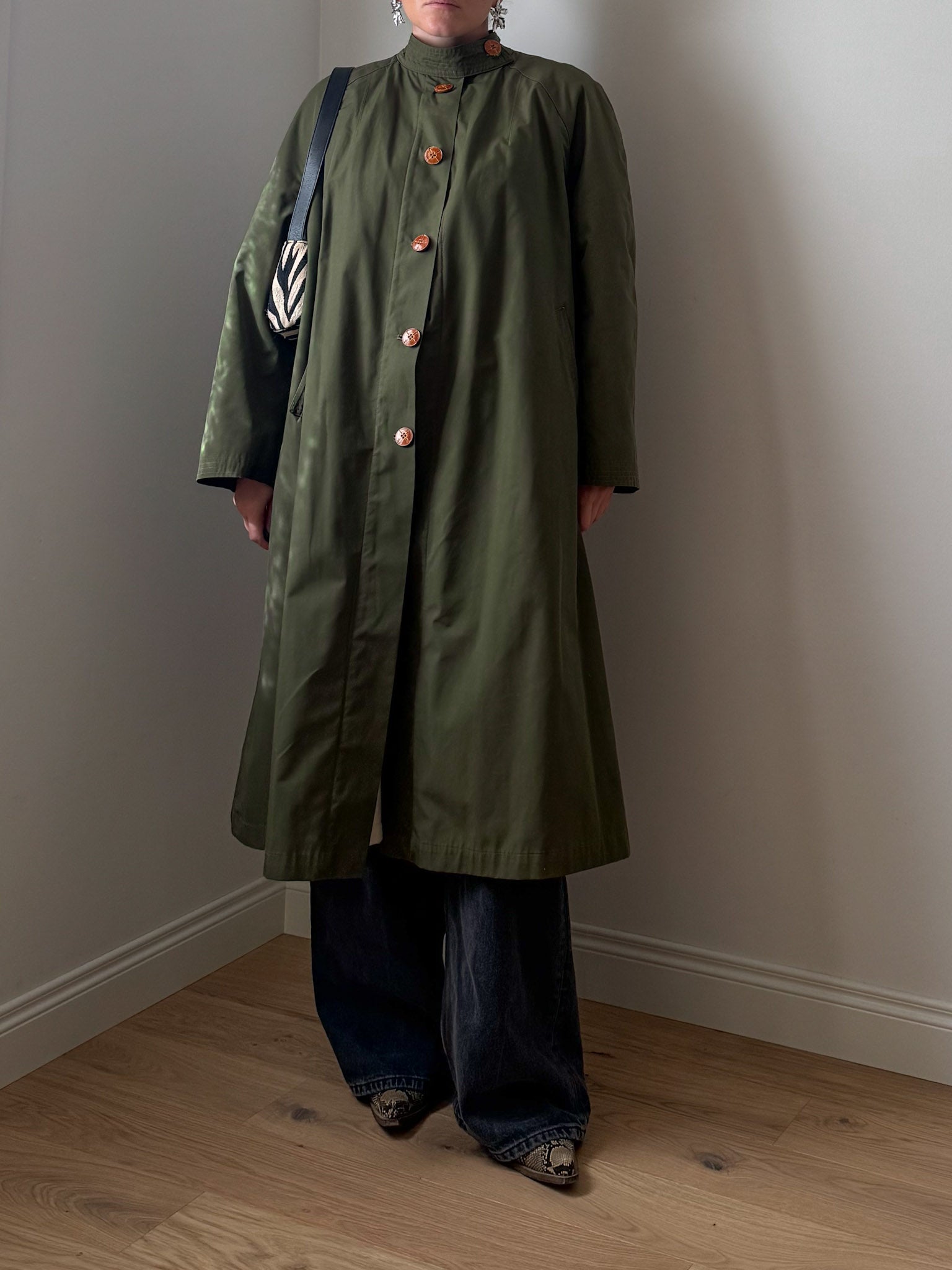 Green quilted-lined trench coat