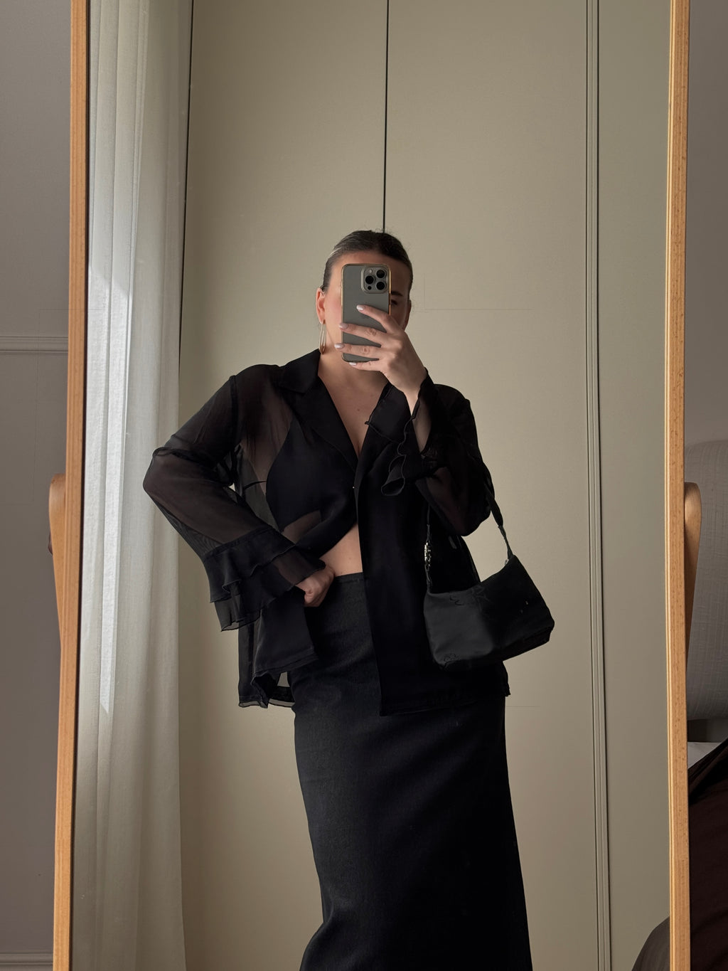 Blusa semitrasparente in viscosa nera