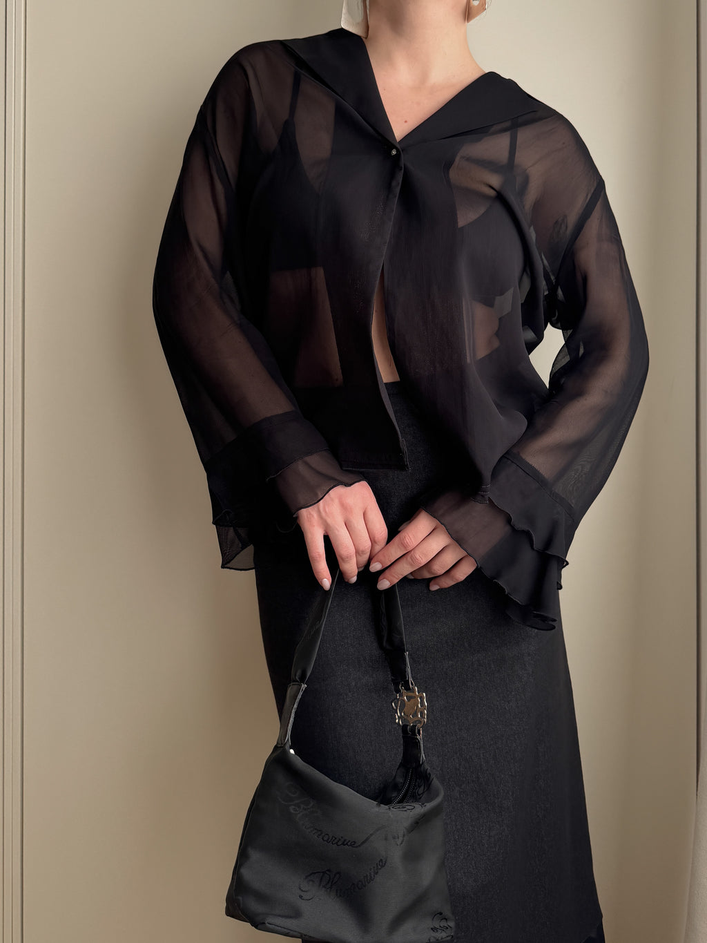 Blusa semitrasparente in viscosa nera