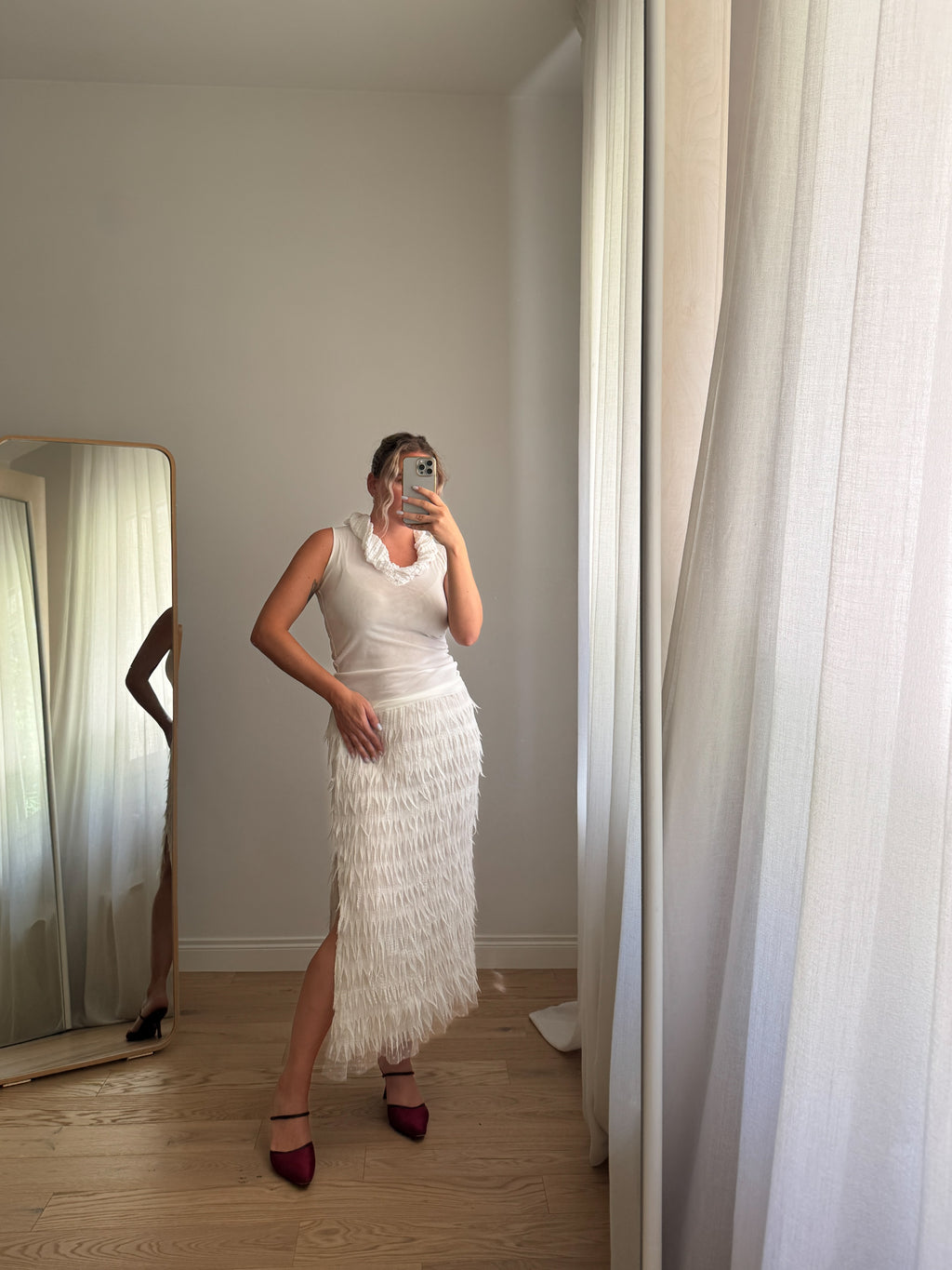 Gonna midi bianca con frange