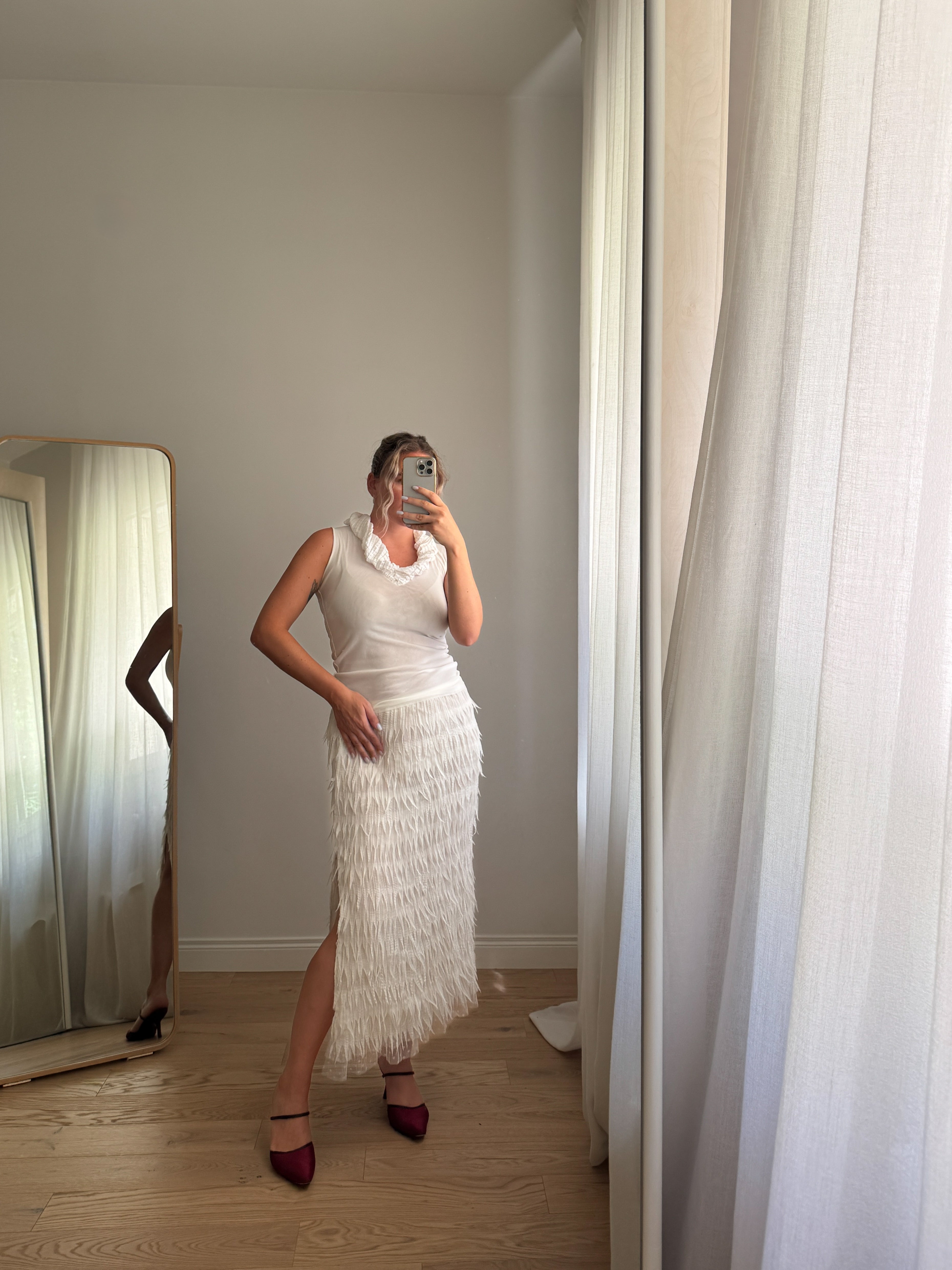 Gonna midi bianca con frange