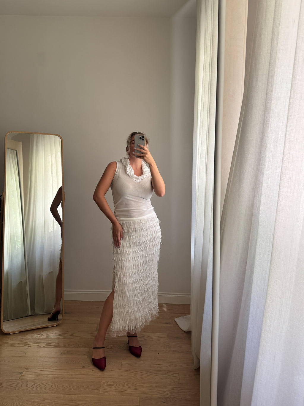 Gonna midi bianca con frange