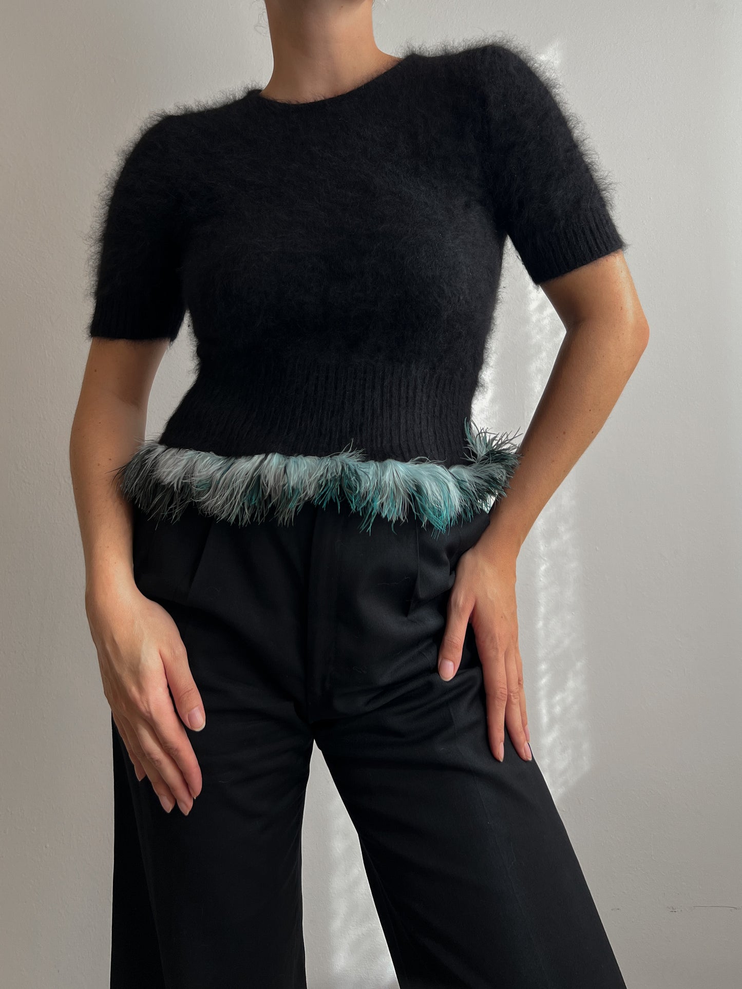 Angora and plumage black pull