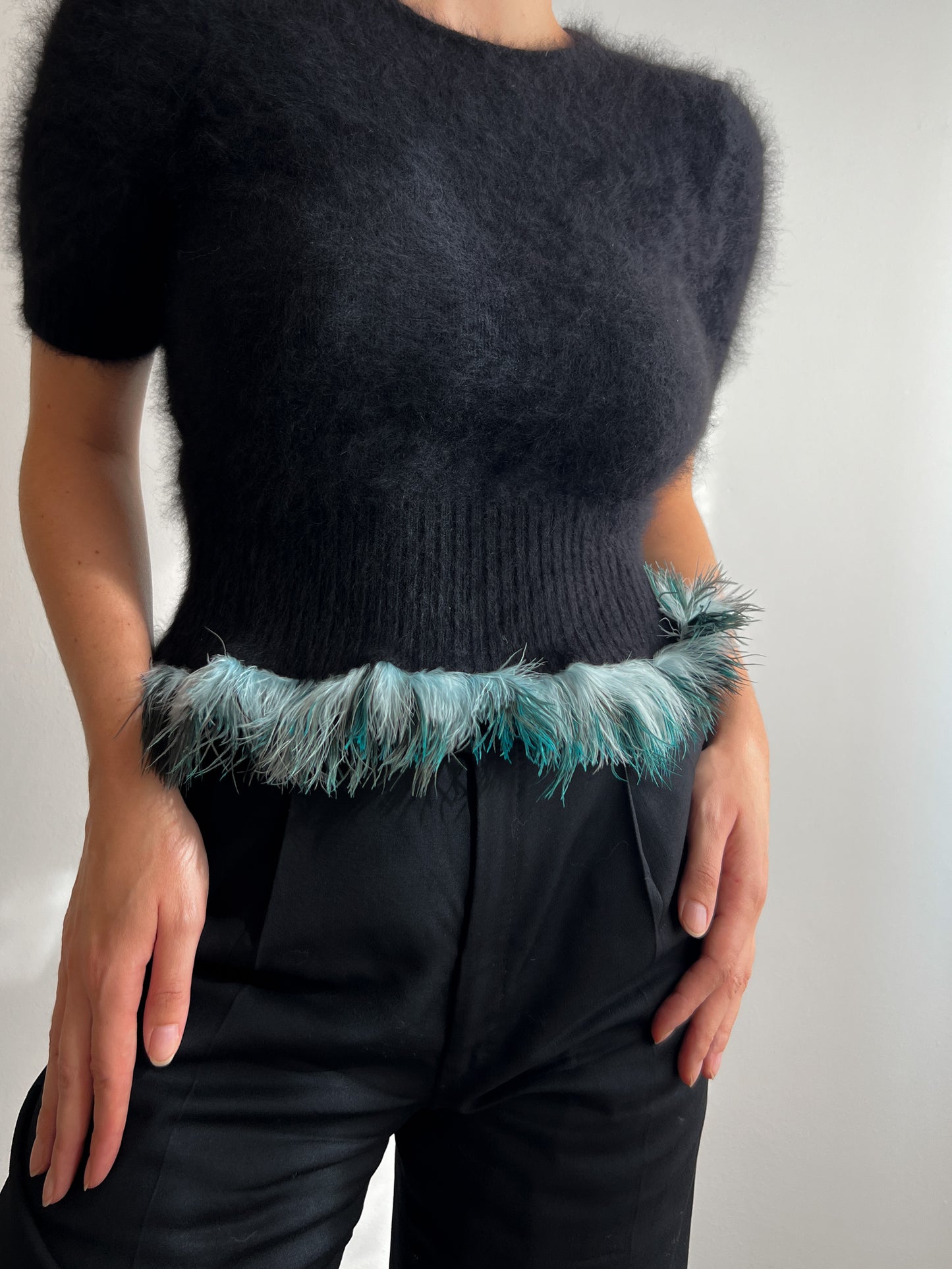 Angora and plumage black pull