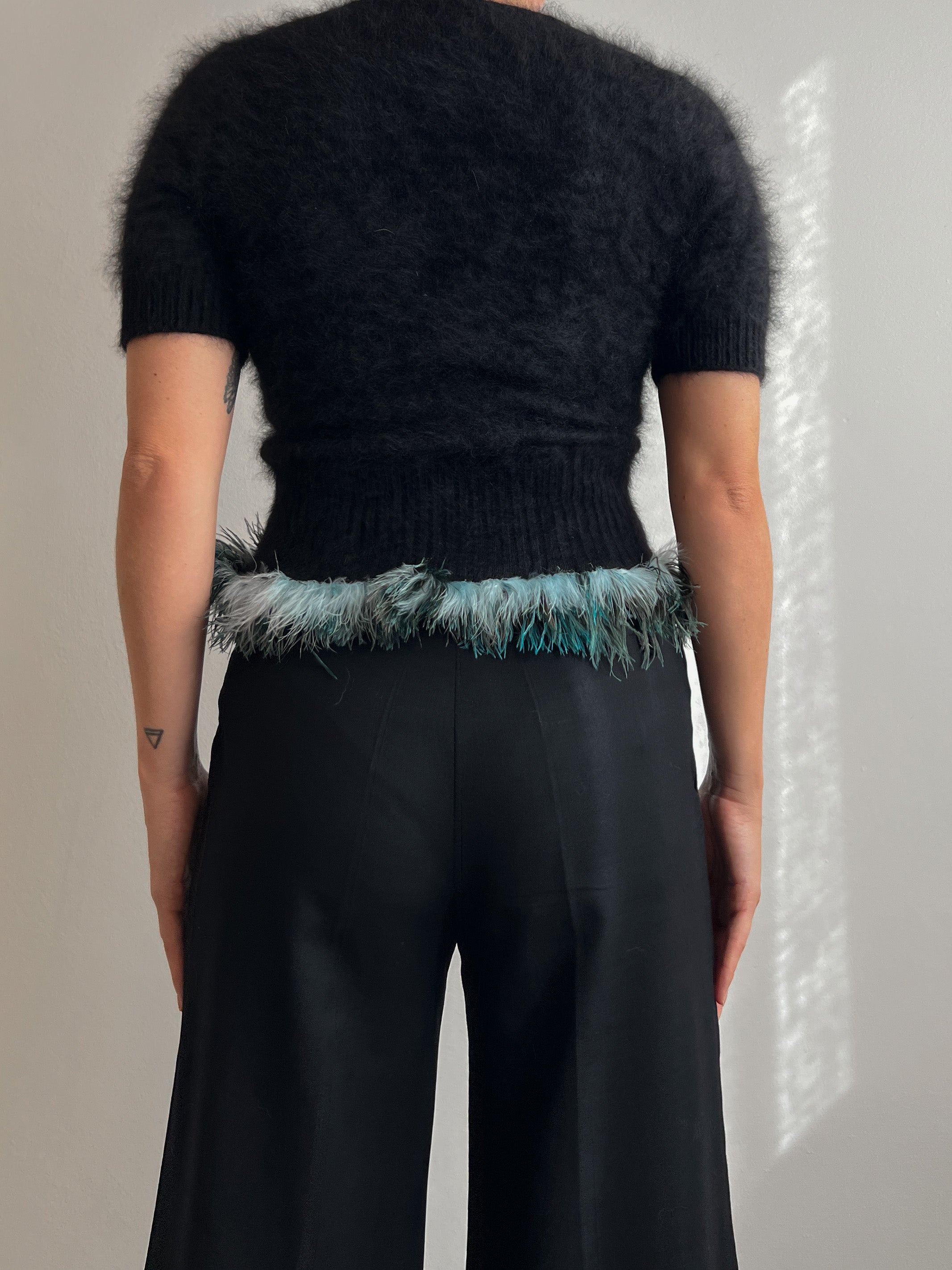Angora and plumage black pull