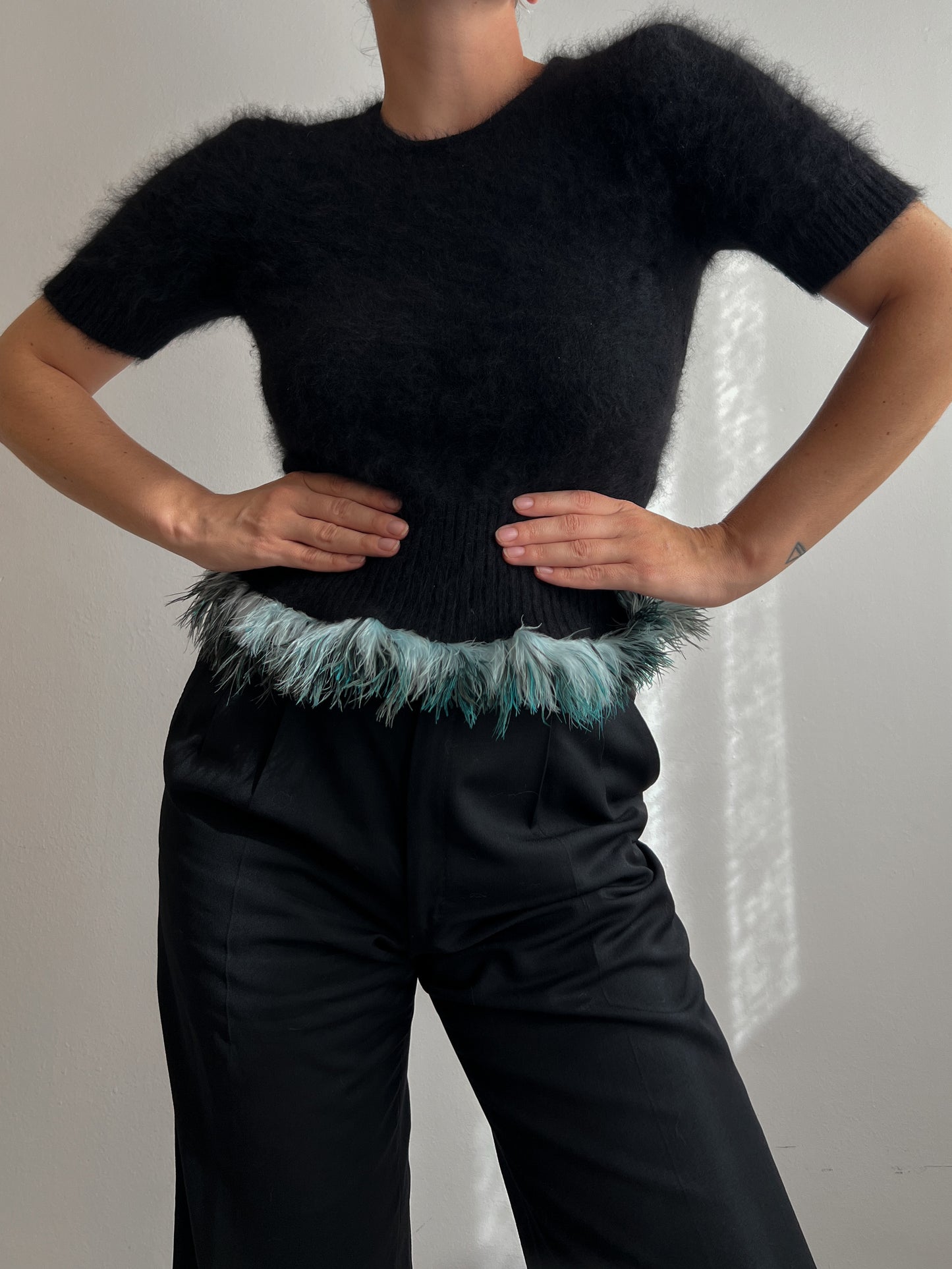 Angora and plumage black pull