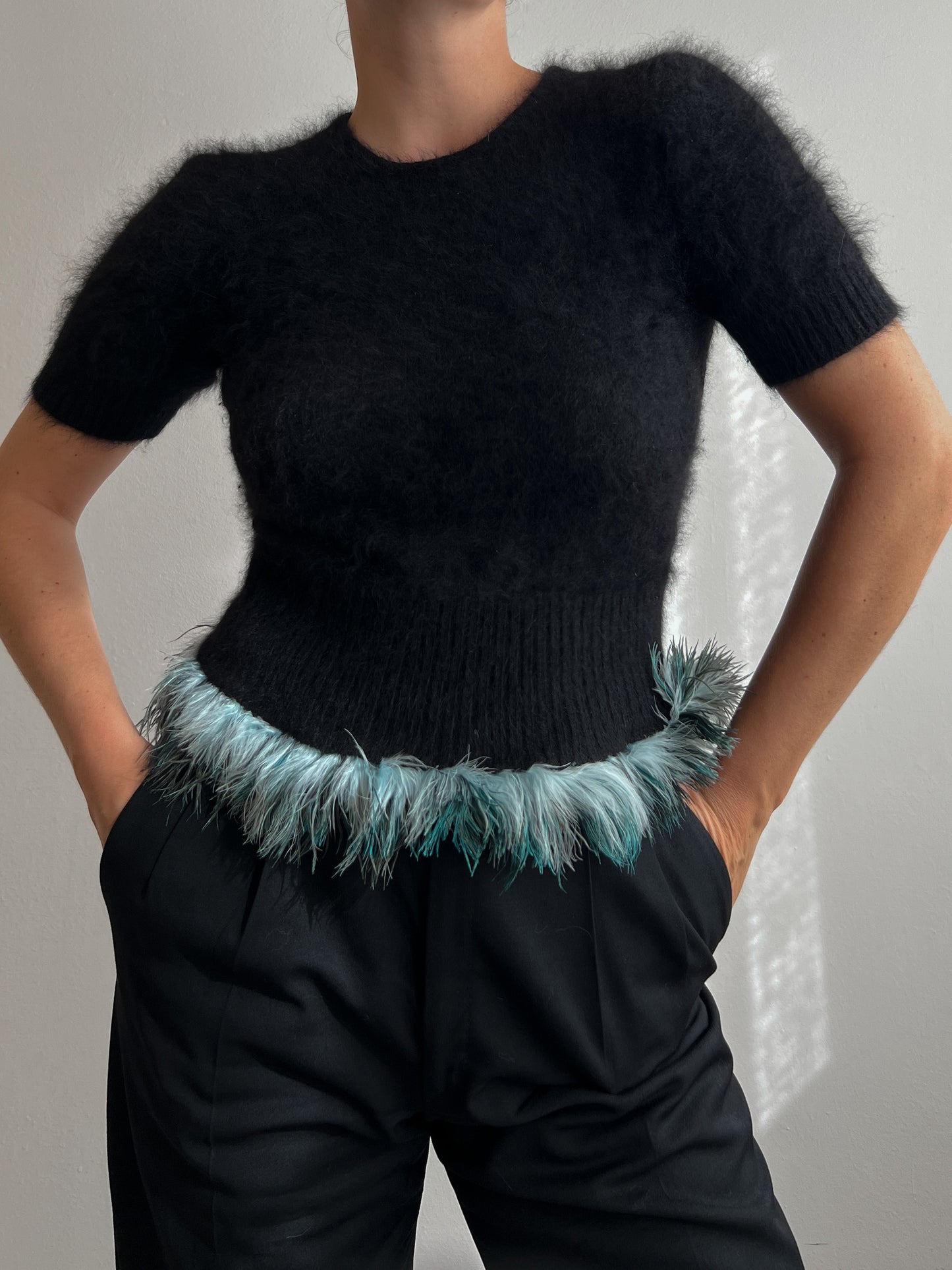 Angora and plumage black pull