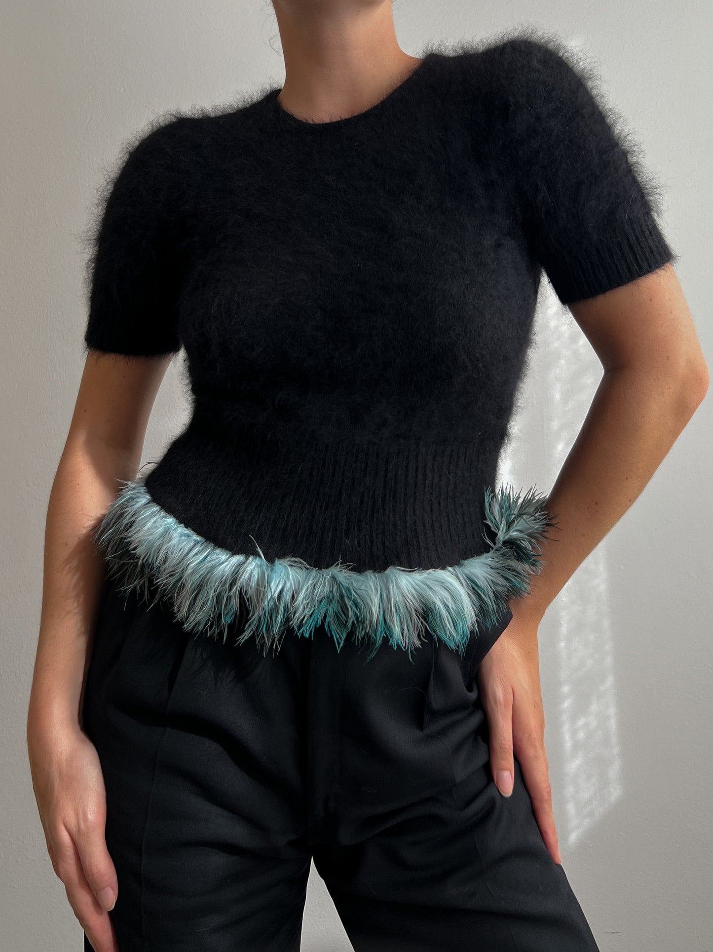 Angora and plumage black pull