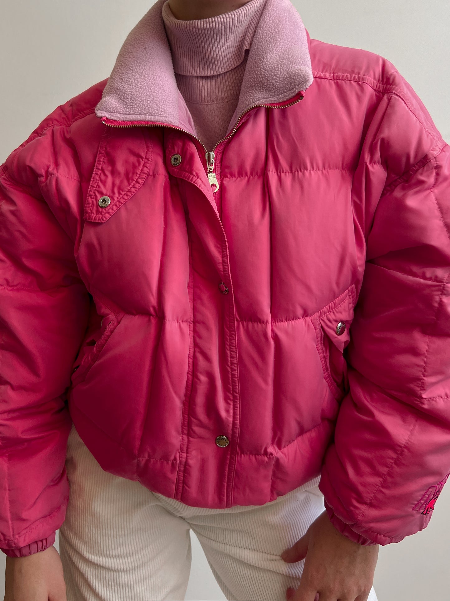 Pink puffer jacket