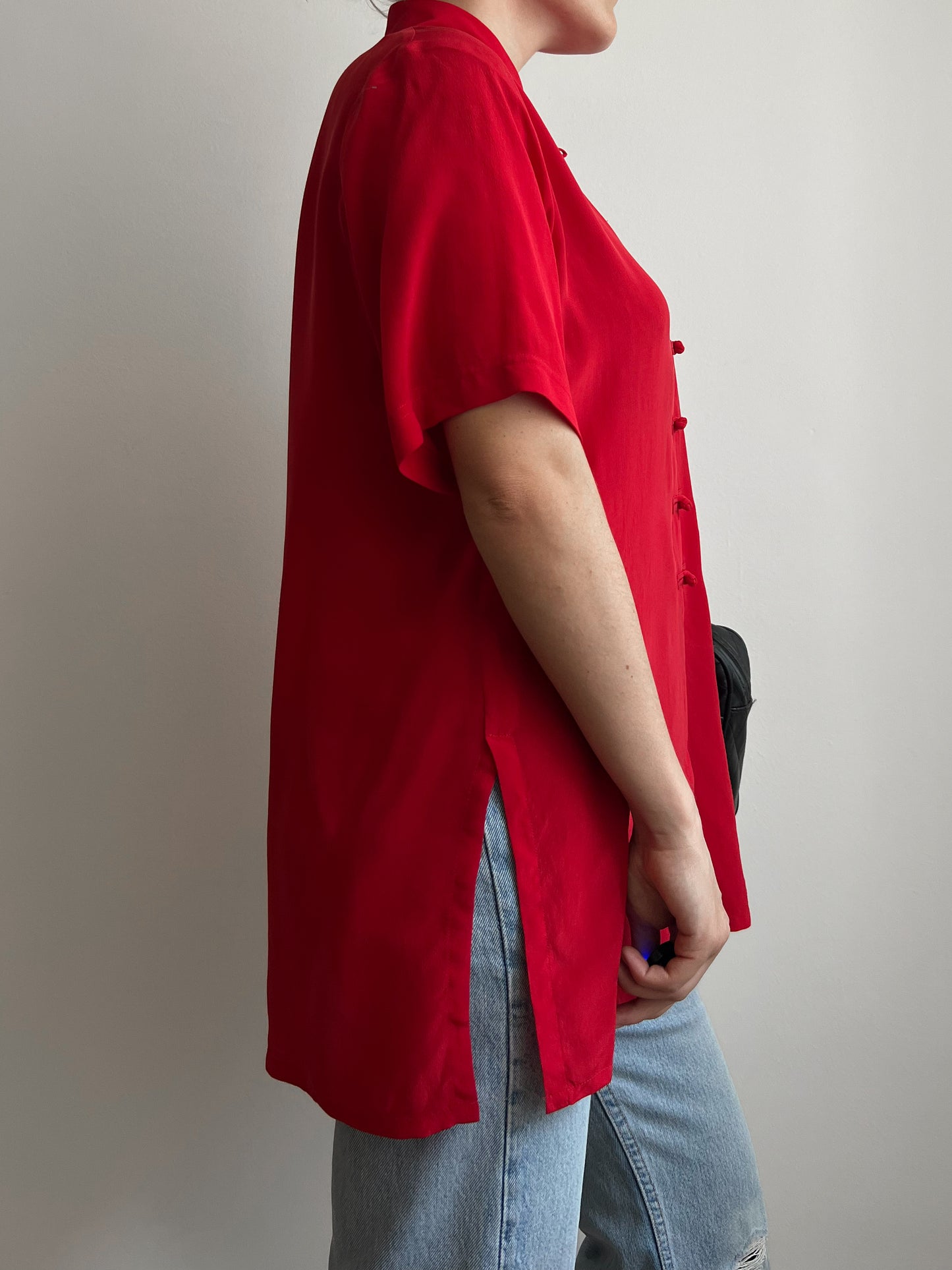 Blusa rossa in seta