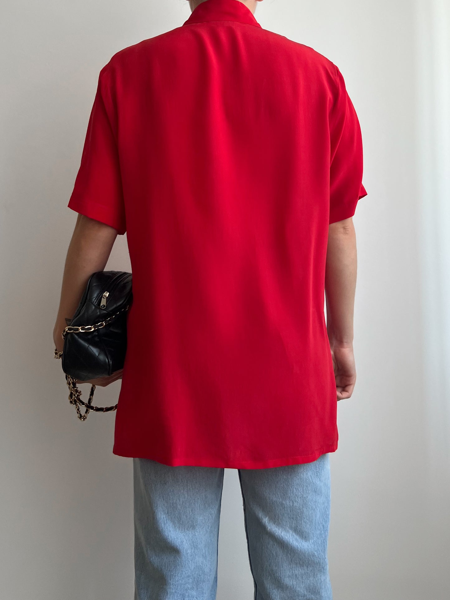 Blusa rossa in seta