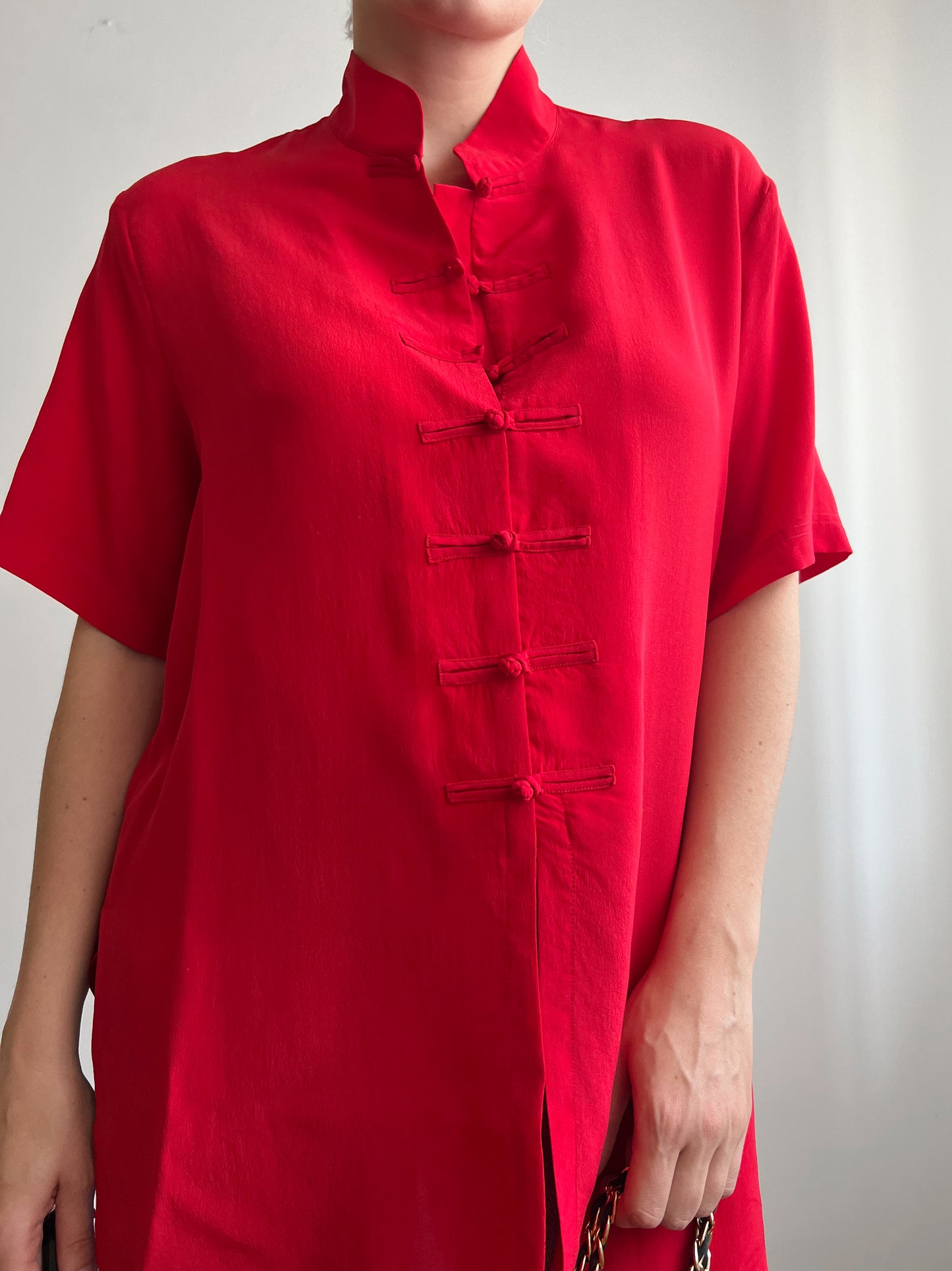 Blusa rossa in seta