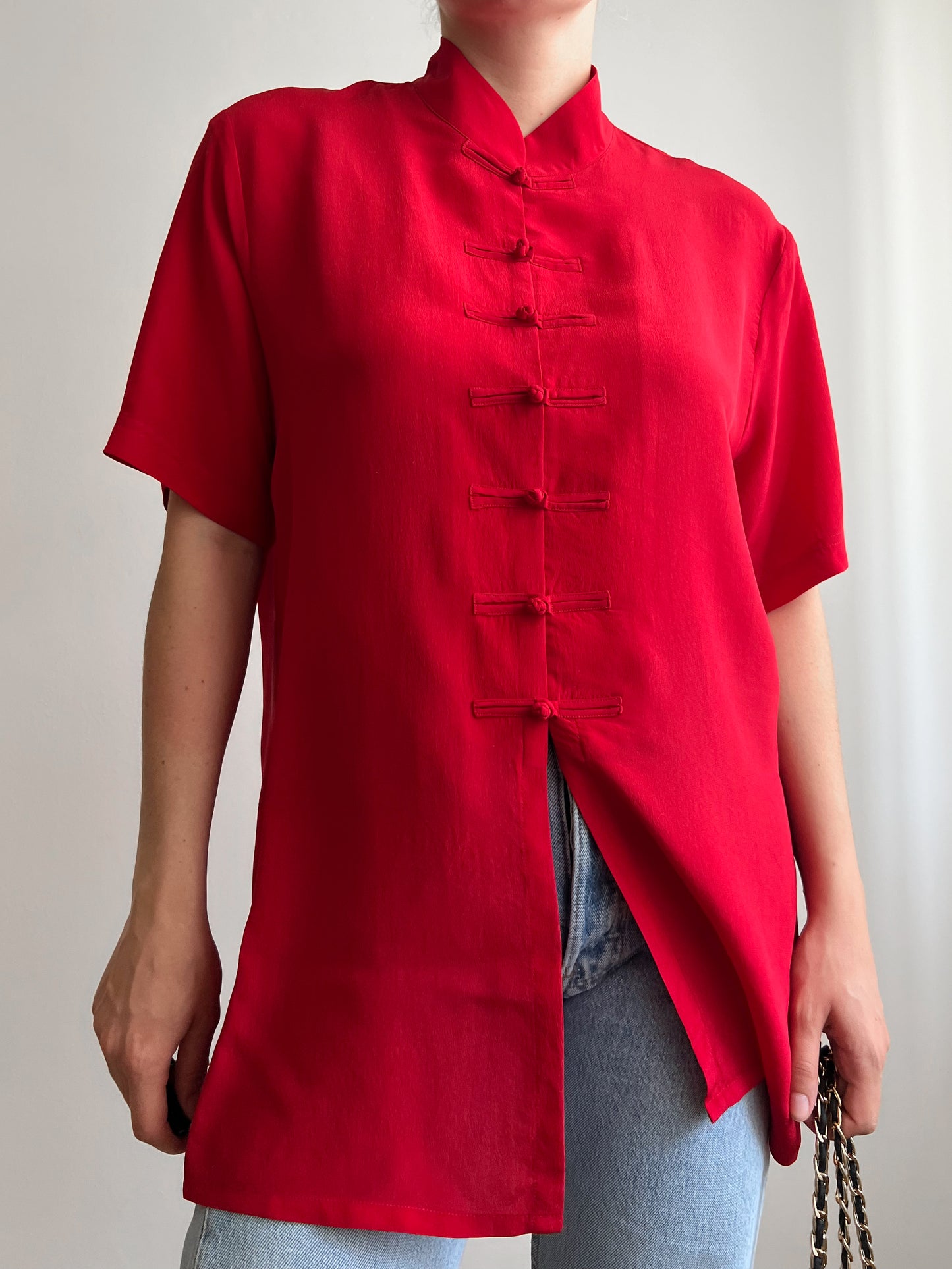 Blusa rossa in seta