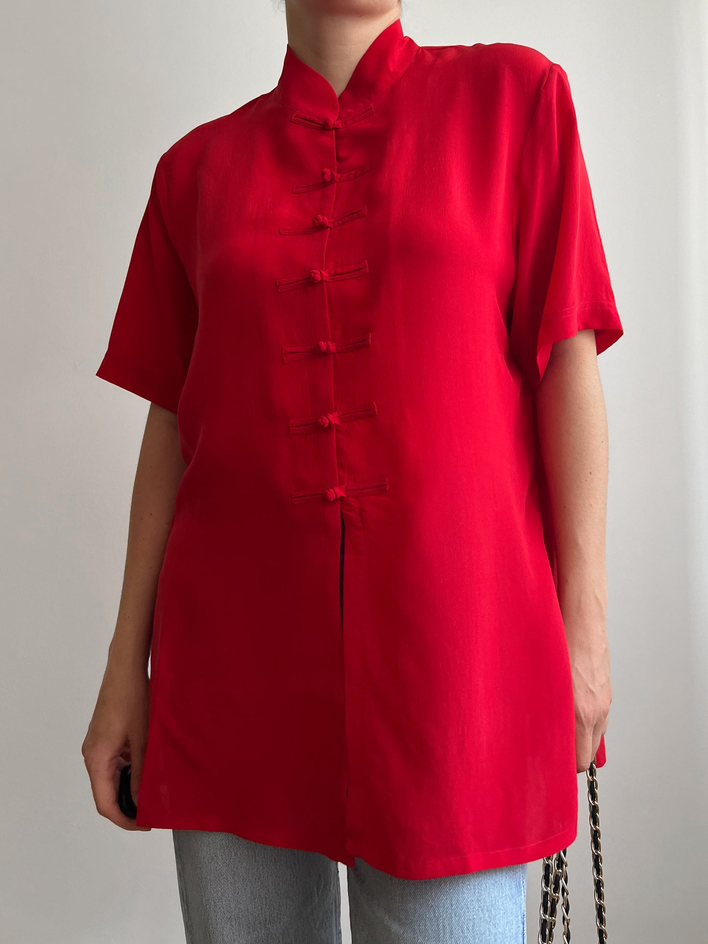 Blusa rossa in seta