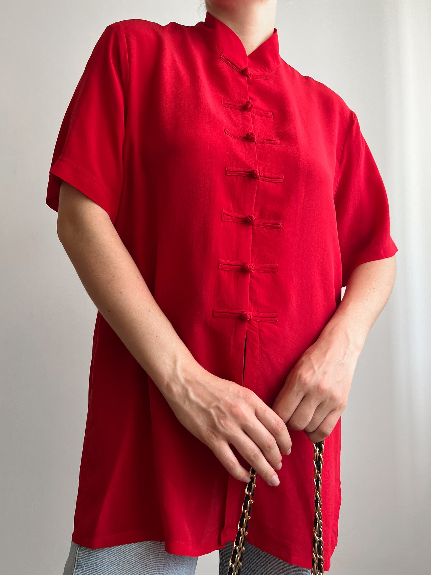 Blusa rossa in seta