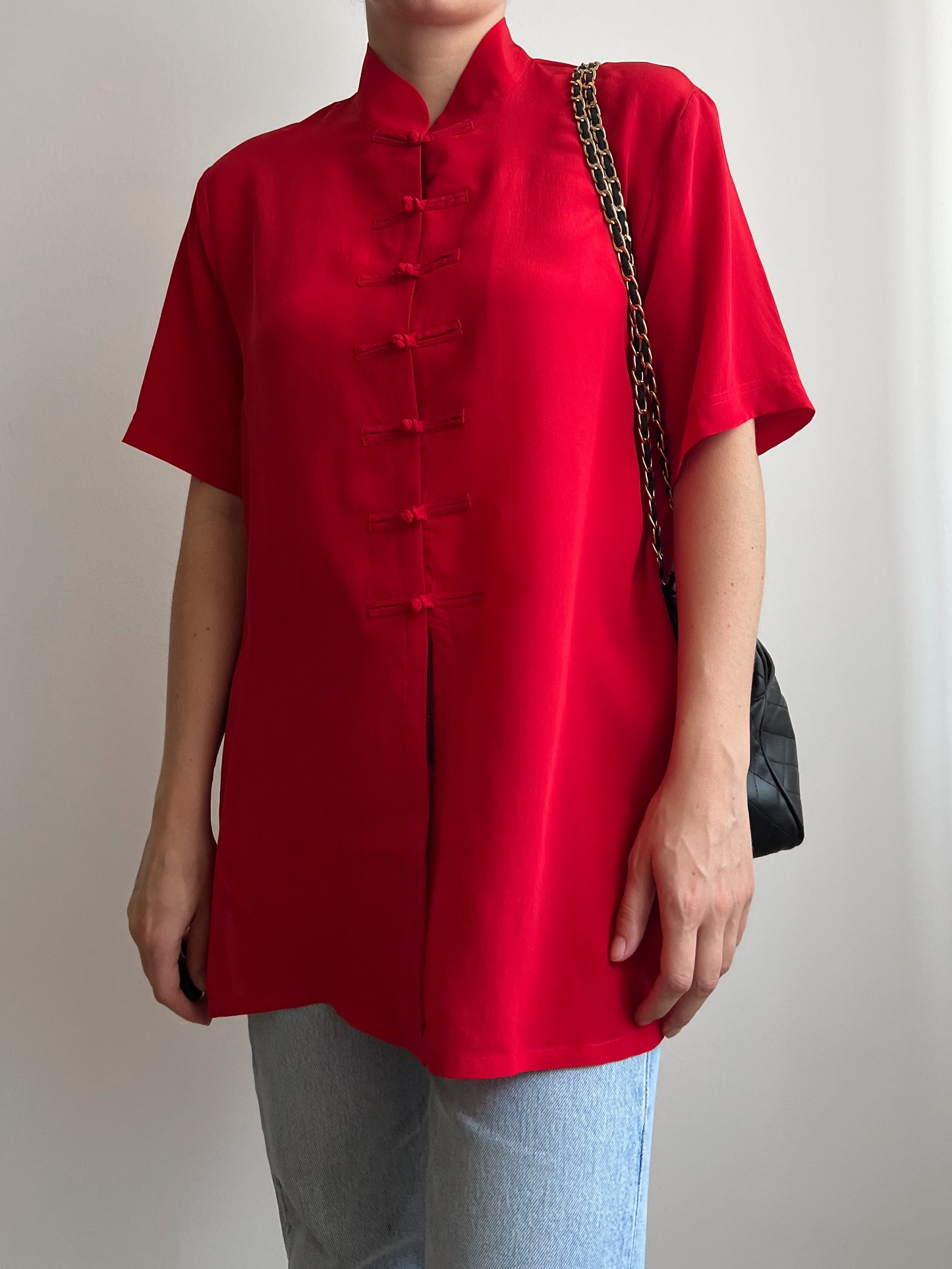 Blusa rossa in seta