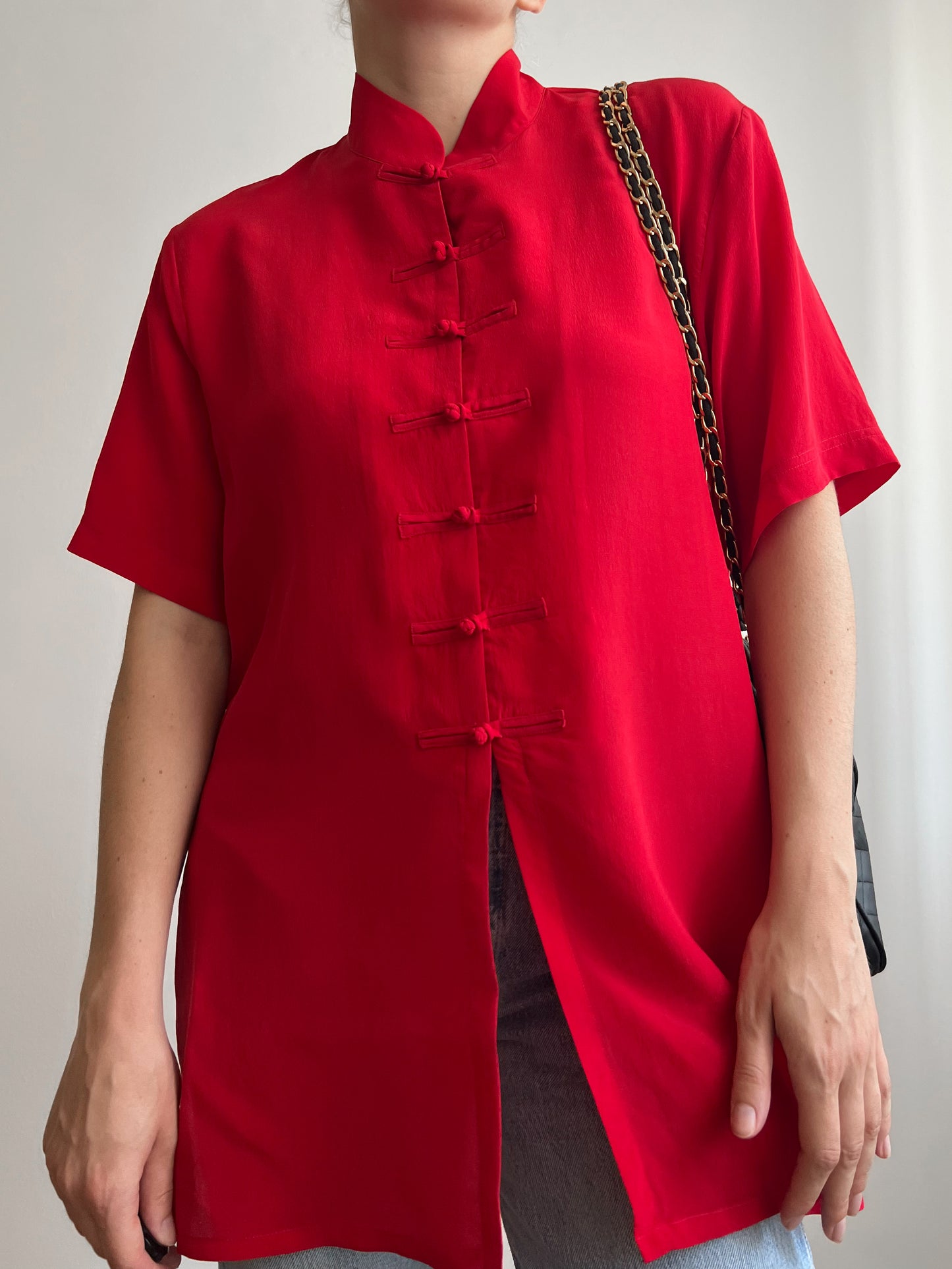 Blusa rossa in seta