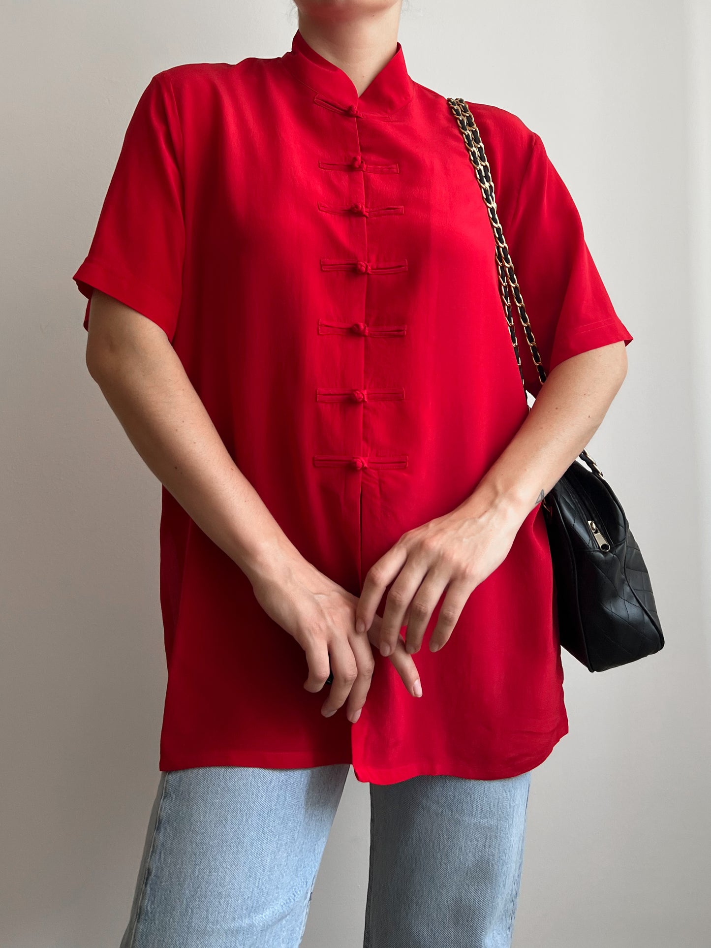 Blusa rossa in seta