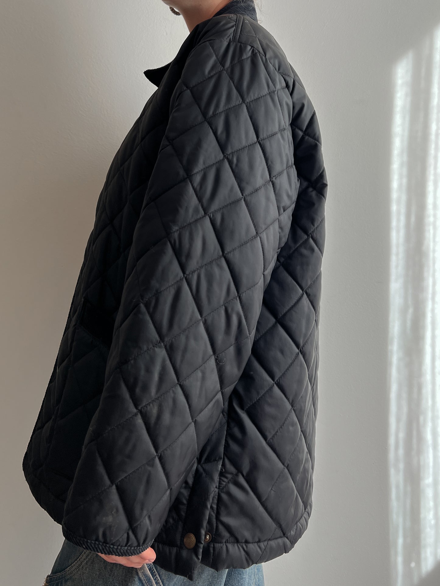 Black quilted jacket