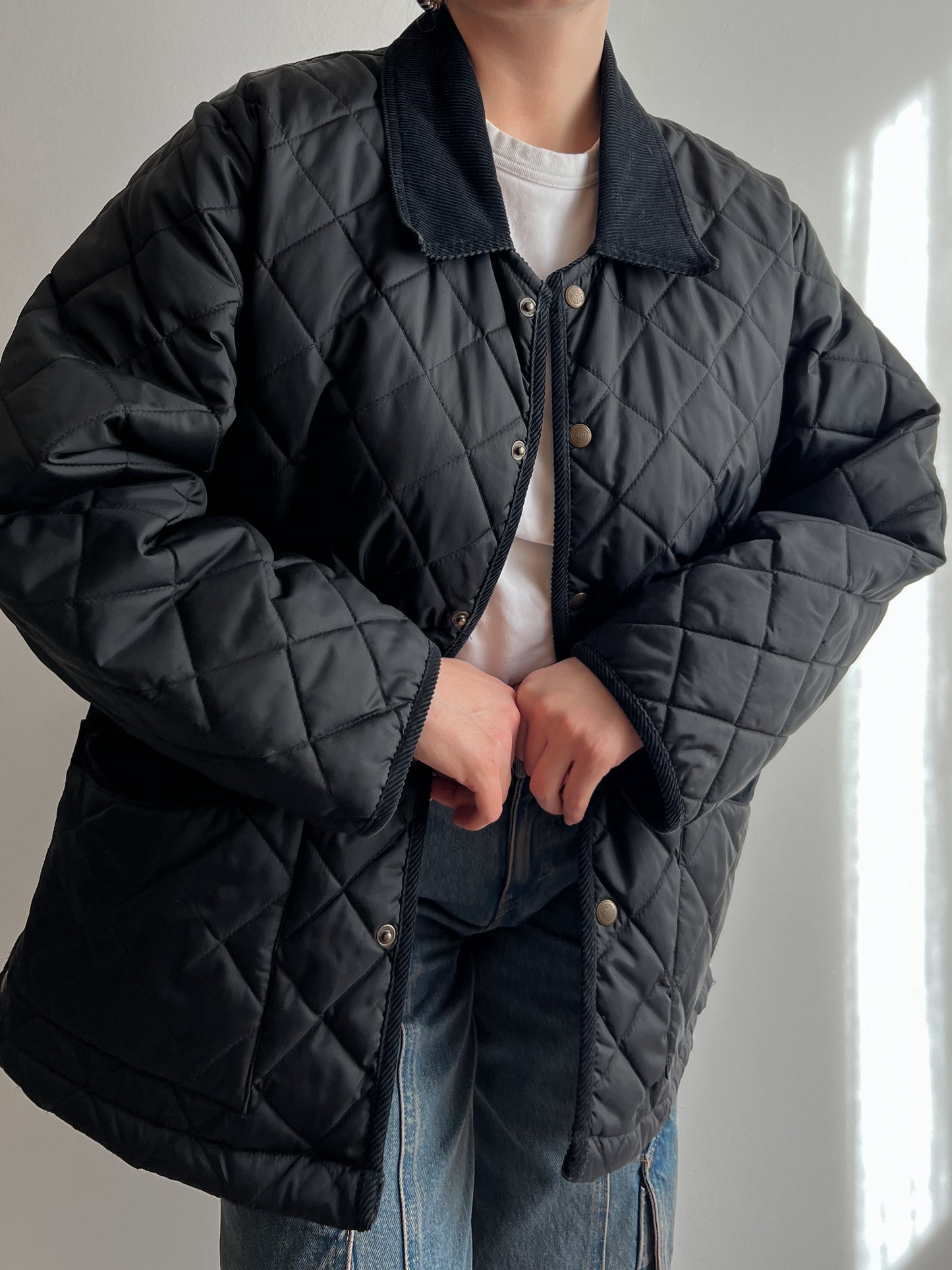 Black quilted jacket