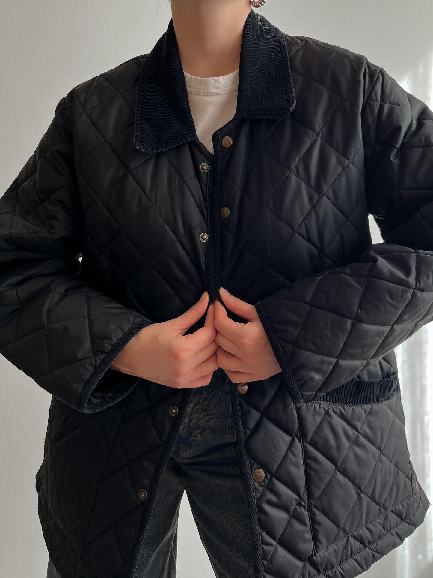 Black quilted jacket