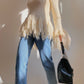 Maglione con maxi frange