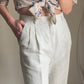 Pantaloni con pinces in lino e cotone
