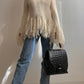 Maglione con maxi frange