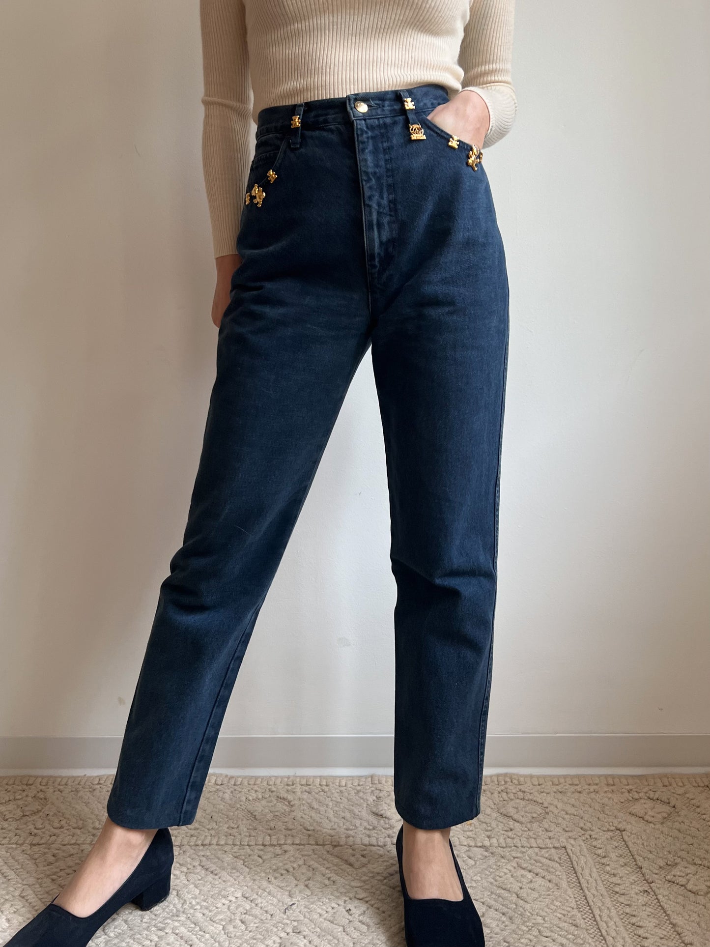 Jeans con orsetti dorati