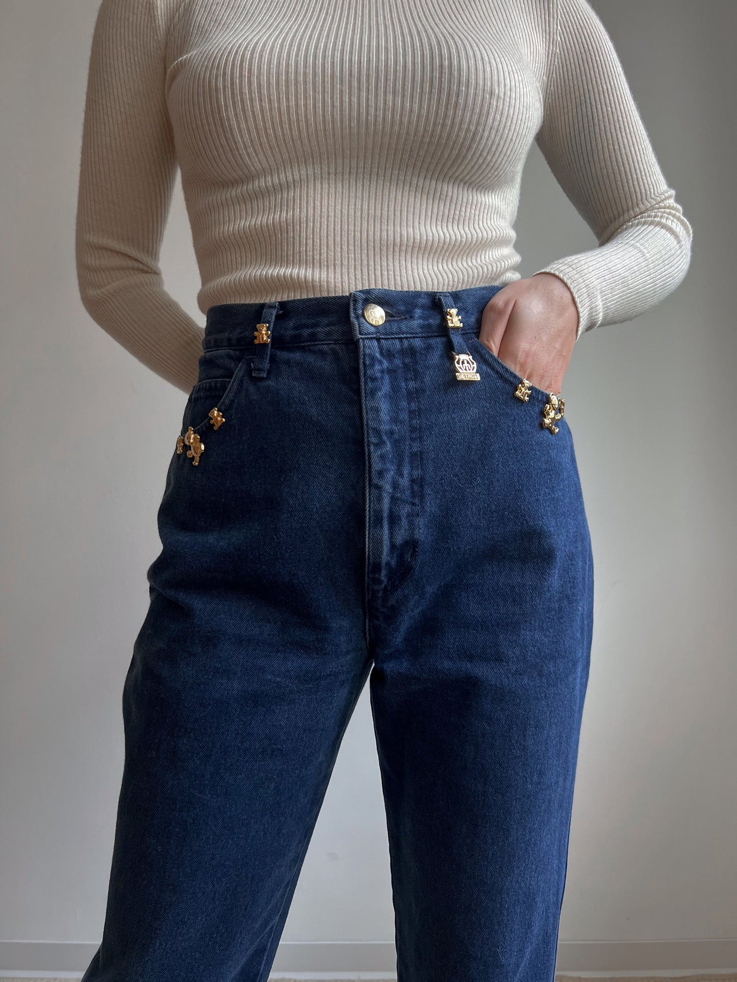 Jeans con orsetti dorati